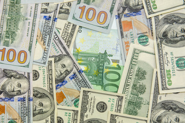 Obraz na płótnie Canvas one hundred dollar and euro banknote
