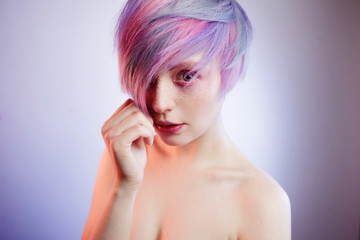 young girl with pink eyes and hair, like a doll