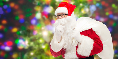 man in costume of santa claus with bag