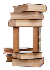 Big stack of old antique books isolated on white background