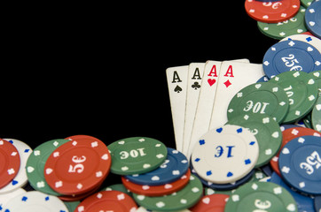 combination of poker playing cards, chips and dollar