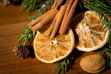 christmas fir branch, cinnamon and dried orange