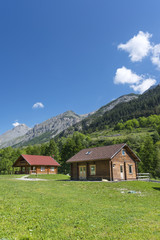 Wooden cottages in the Alps