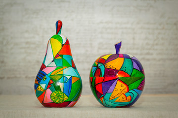 decorative apple and pear, made of wood and painted by hand paints. Modern single-piece art