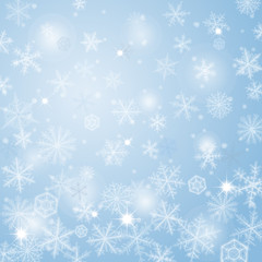 Abstract light blue christmas background with snowflakes.