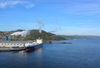 Fototapeta premium view from the ocean towards the western shoreline of Corner Brook, Newfoundland, Canada