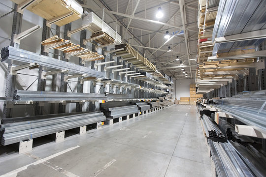 construction material warehouse, shelves with aluminum profiles