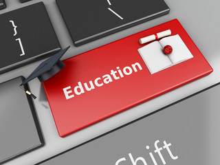 3d graduation cap and diploma on computer keyboard.