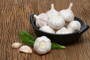 garlic isolated on wooden background