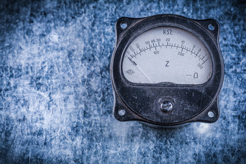 Electric instrument of measurement on metallic background vintag
