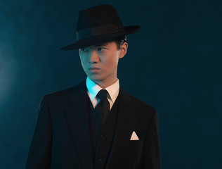 Retro 1940 asian gangster fashion man.