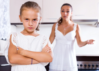 quarrelling woman and female child