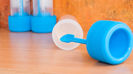 Stool sample jars with transport medium