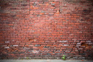 Hintergrund schwarze Backsteinwand mit Fehlstellen