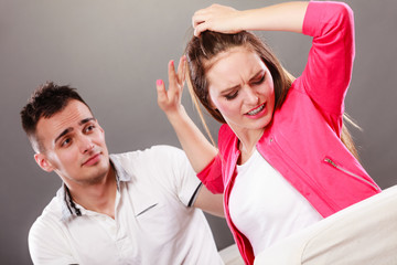 Husband apologizing wife. Heartbroken woman.