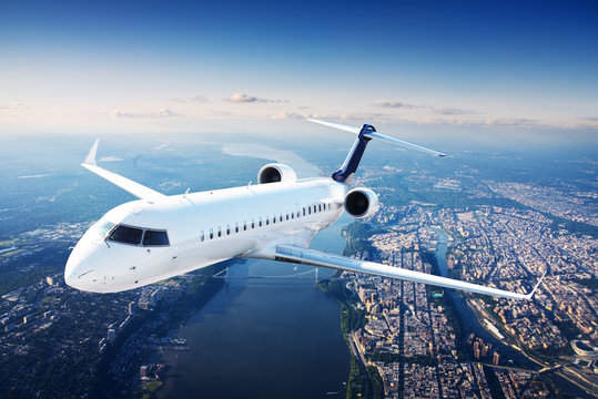 Fototapeta Private jet plane in the blue sky
