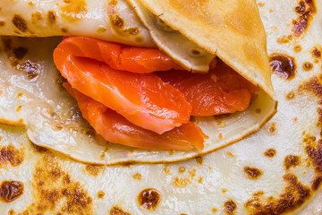 pancakes with smoked salmon and butter on Shrovetide