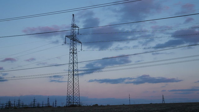 High-voltage Line. Poles With Wires at Sunset. Timelapse