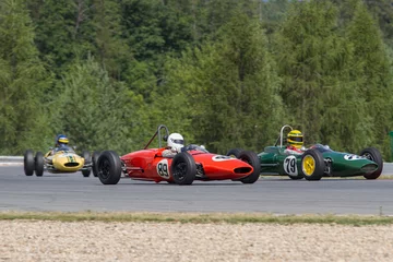 Crédence de cuisine en verre imprimé Sport automobile bataille de voitures historiques