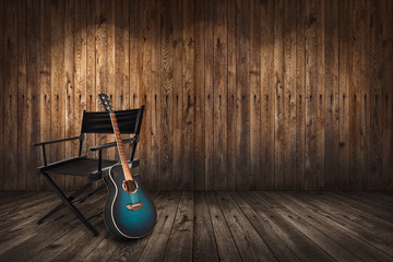 Naklejka premium Guitar near chair on wooden wall background