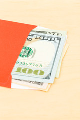 Money dollar in red envelope