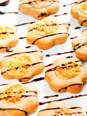 Cookies with chocolate toppling