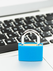 Padlock on keyboard concept computer security