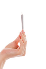 Holding cannabis joint.