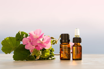 Geranium essential oils in bottles