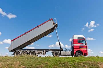 Tipper truck on road © Oleg Totskyi