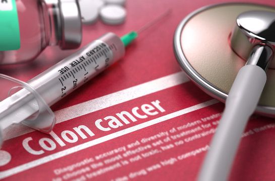 Colon cancer - Printed Diagnosis on Red Background.
