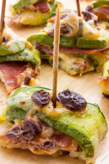 Zucchini and bacon rolls baked