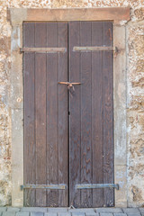 Sunset door in stone wall