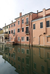 Fototapeta na wymiar Italy, Ancient residential houses in Chioggia old town