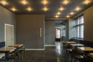 Interior of restaurant. Wooden design.