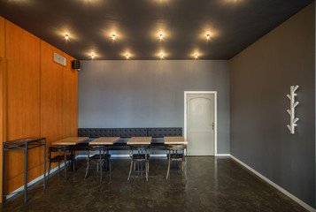 Interior of restaurant. Wooden design.