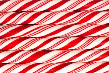 Fotobehang Full background of red and white striped Christmas candy canes © Jenifoto