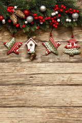 christmas decorations with ornaments on wooden background