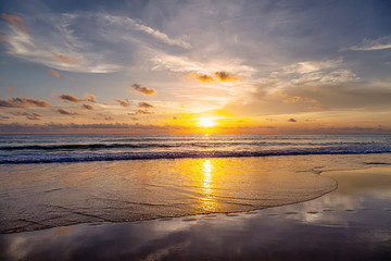 Obraz na płótnie Canvas Sunset on the beach of Patong. Phuket Island. Thailand.
