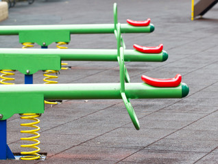 Close up of colorful seesaw.