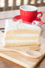 Hot coffee cup and young coconut cake