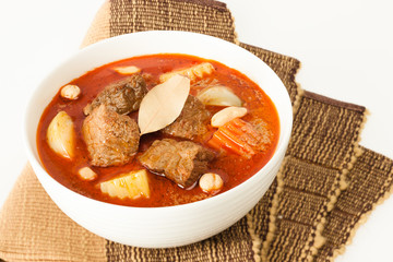 Beef massaman red curry with vegetables and peanuts