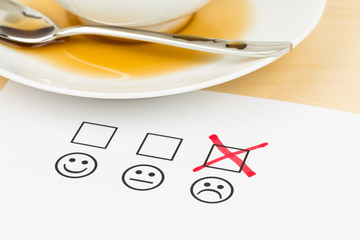 Customer satisfaction survey checkbox with poor symbol tick