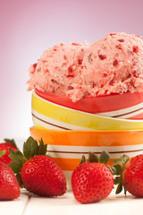 fresh Strawberries and strawberry ice cream scoop