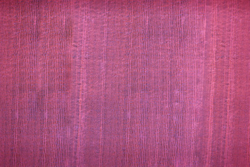 Pink abstract background from silk fabric pattern