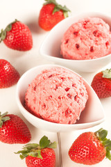 fresh Strawberries and strawberry ice cream scoop
