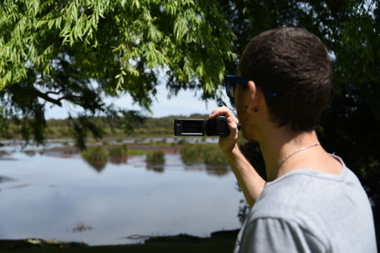 Man filming Nature