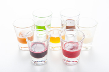 Group of drinks in rainbow colors