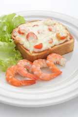 Wheat bread toasts with cream cheese and shrimp selective focus