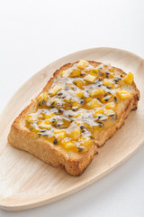 breakfast with toast fruit jam and butter on table